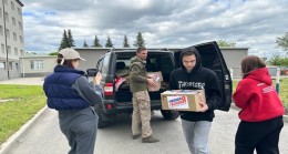 “Birleşik Rusya” ve MGER, Ukrayna Silahlı Kuvvetlerinin saldırısı sonucu girişi tamamen yıkılan bir evden tahliye edilen Belgorod sakinlerine yardım sağlıyor